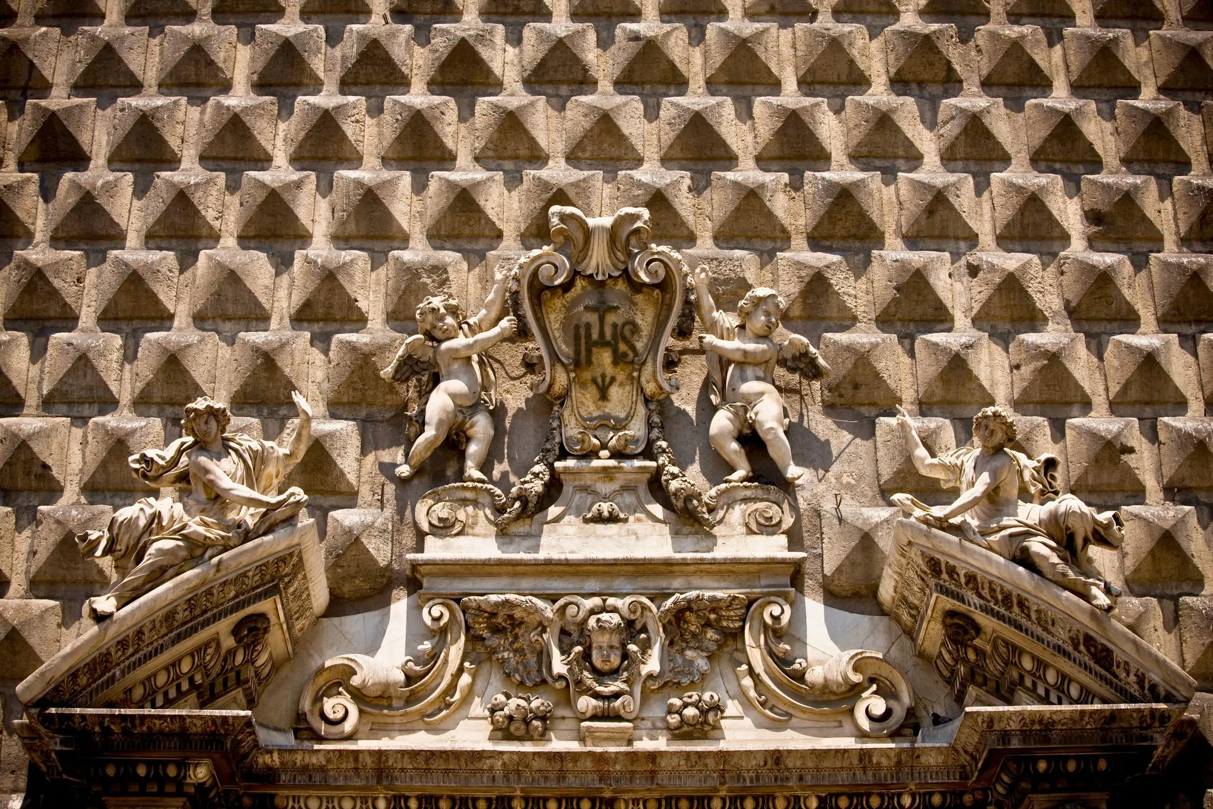 Chiesa del Gesù Nuovo Facade The rusticated diamond-point stone facade of Chiesa del Gesù Nuovo in Naples