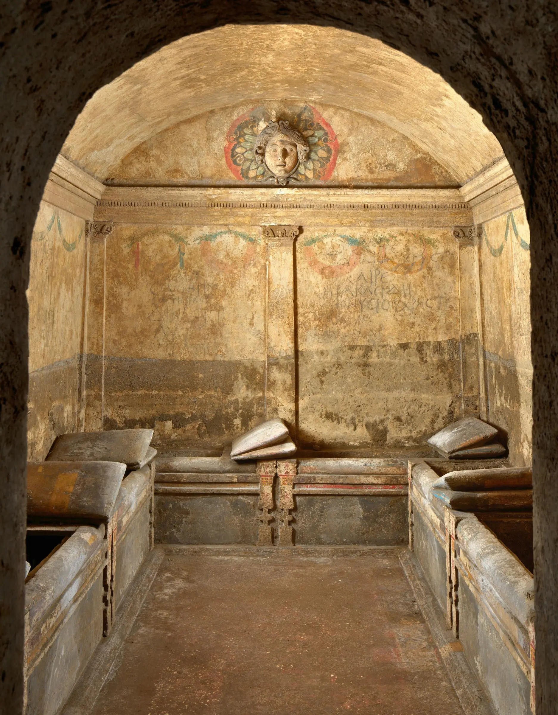 Ancient Hellenistic frescoes inside the Hypogeum of Crystallines in Naples