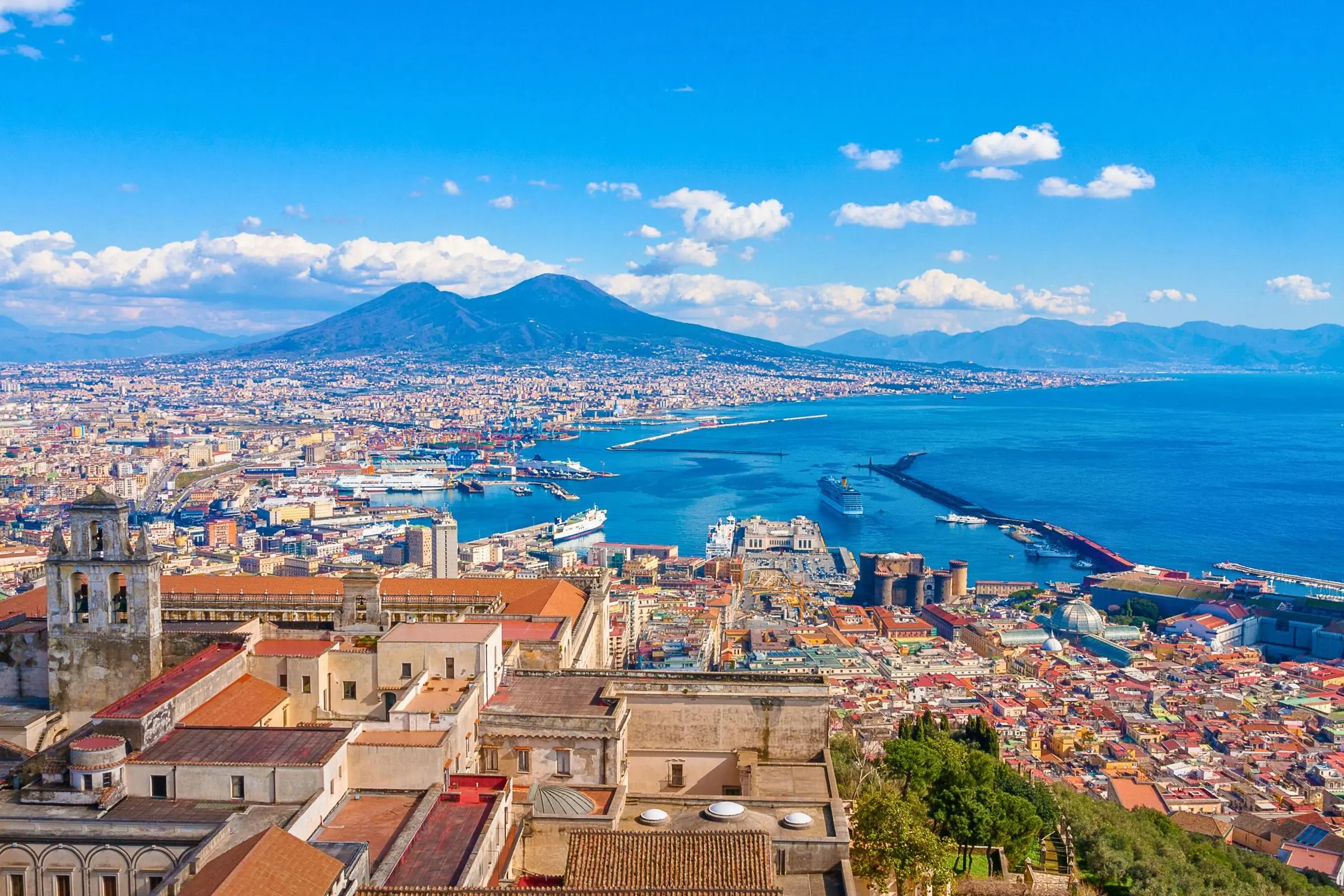 View of Naples city center with Mount Vesuvius in the background